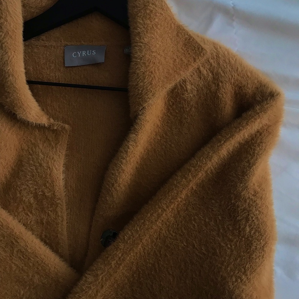 Gently used. Almost new sweater like coat.